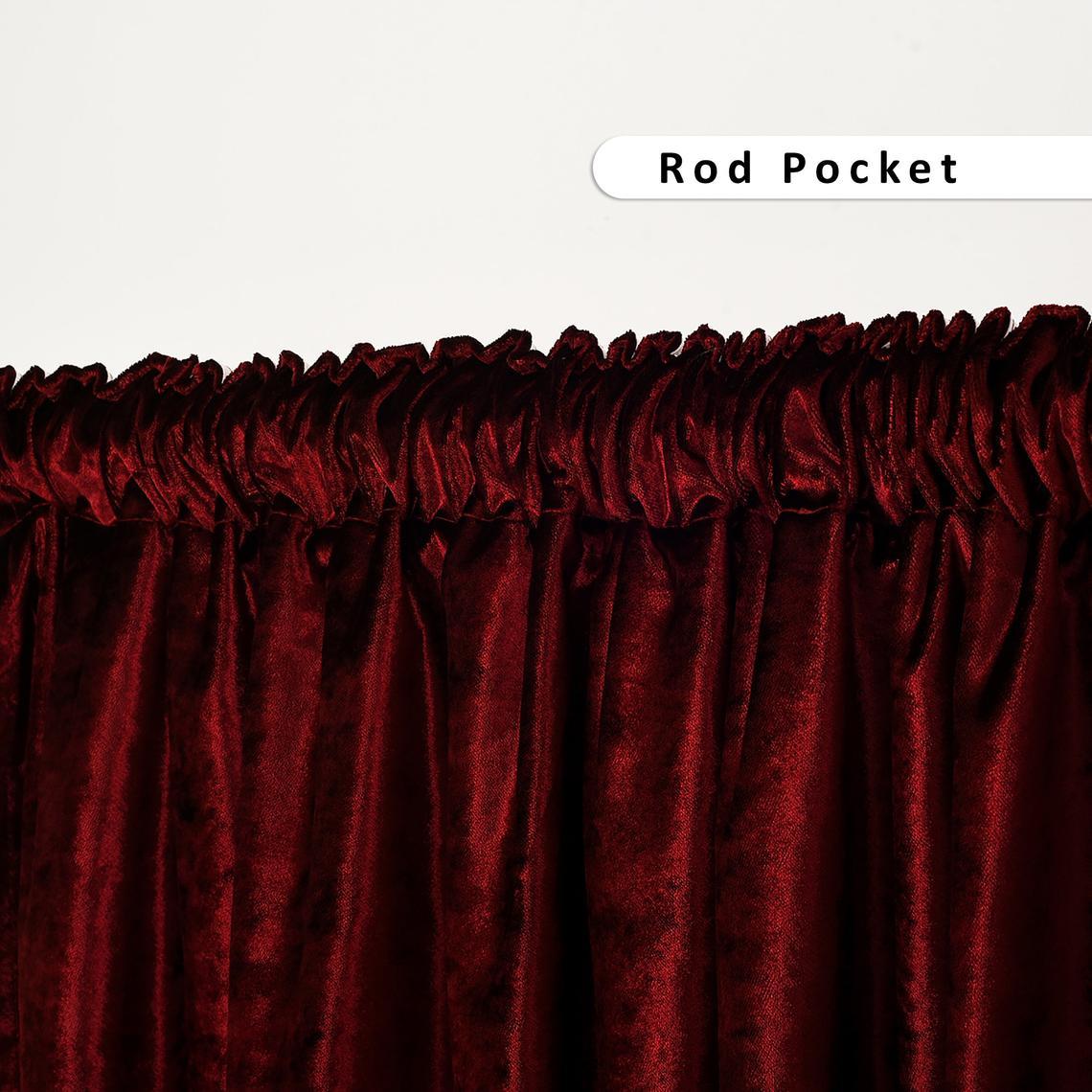 Burgundy Luxury Velvet Curtain hanging elegantly in a stylish room, showcasing its rich color and soft texture.