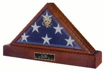 Elegant burial flag display case made of solid walnut with a cherry wood finish, featuring beveled glass and the gold Great Seal of the U.S.