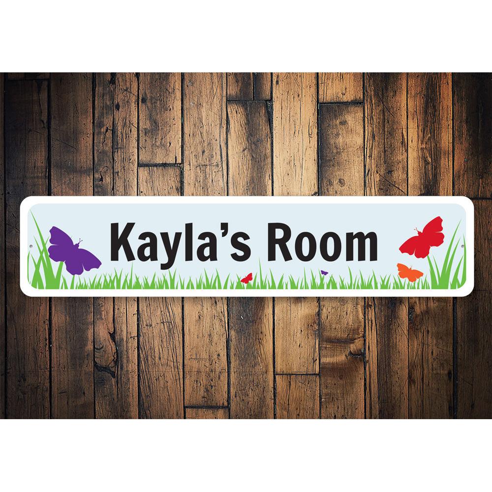 A colorful Butterfly Room Sign made of aluminum, featuring a vibrant butterfly design, perfect for children's room decor.