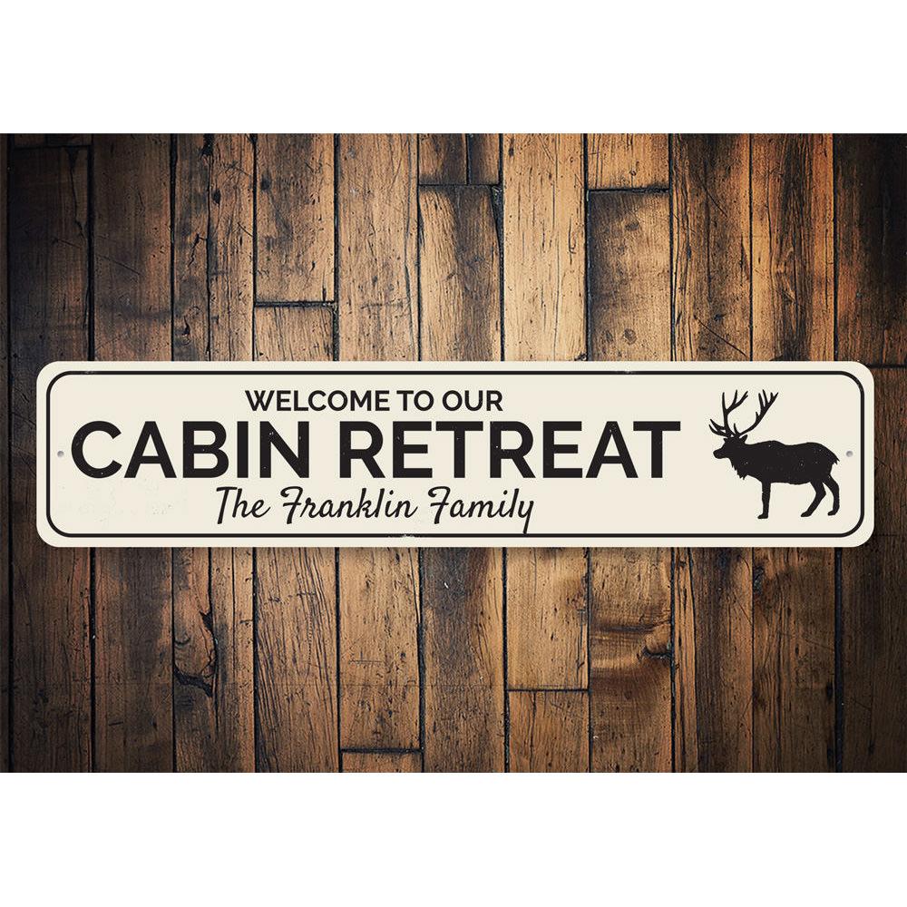 A beautifully crafted Cabin Retreat Sign made of high-quality aluminum, showcasing a personalized design perfect for lakehouse decor.