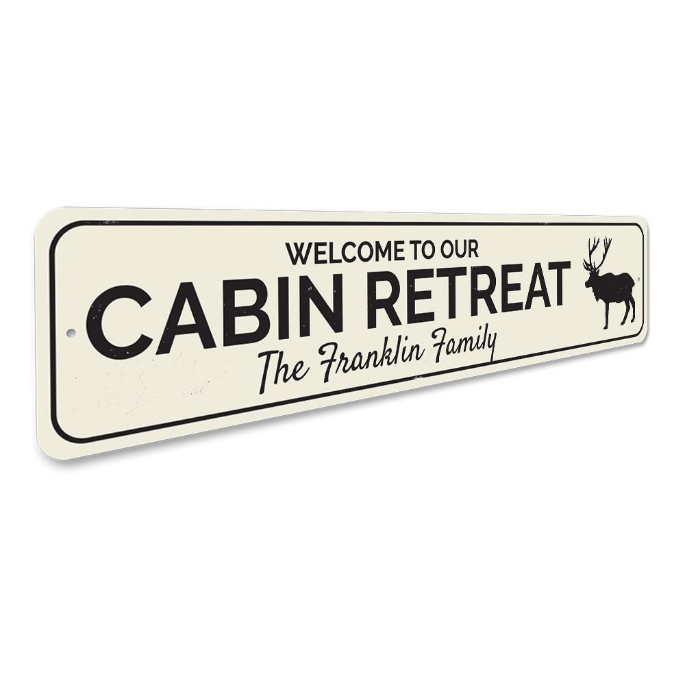 A beautifully crafted Cabin Retreat Sign made of high-quality aluminum, showcasing a personalized design perfect for lakehouse decor.