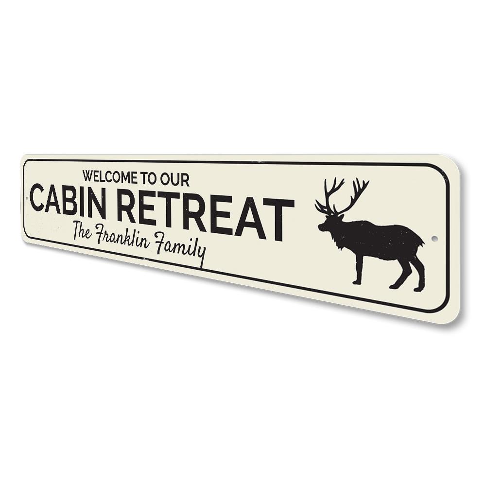 A beautifully crafted Cabin Retreat Sign made of high-quality aluminum, showcasing a personalized design perfect for lakehouse decor.