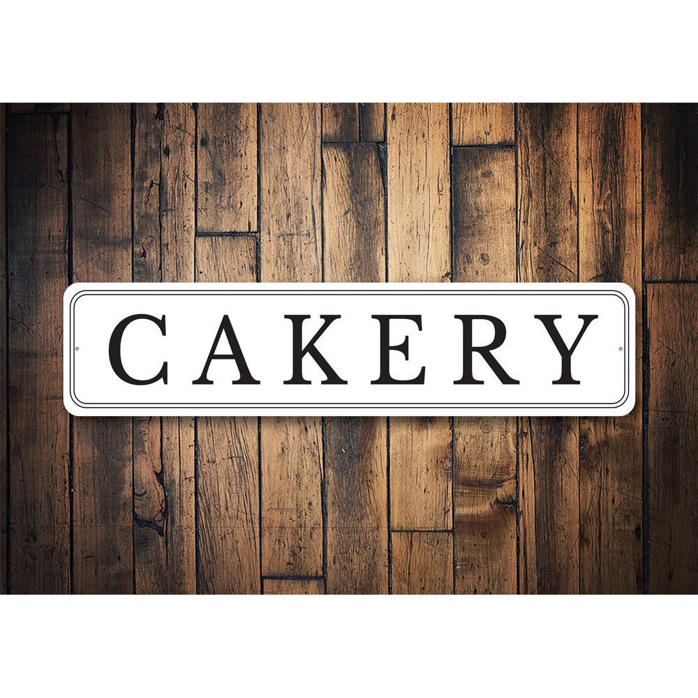 Customizable Cakery Sign made from high-quality aluminum, featuring pre-drilled holes for easy mounting.