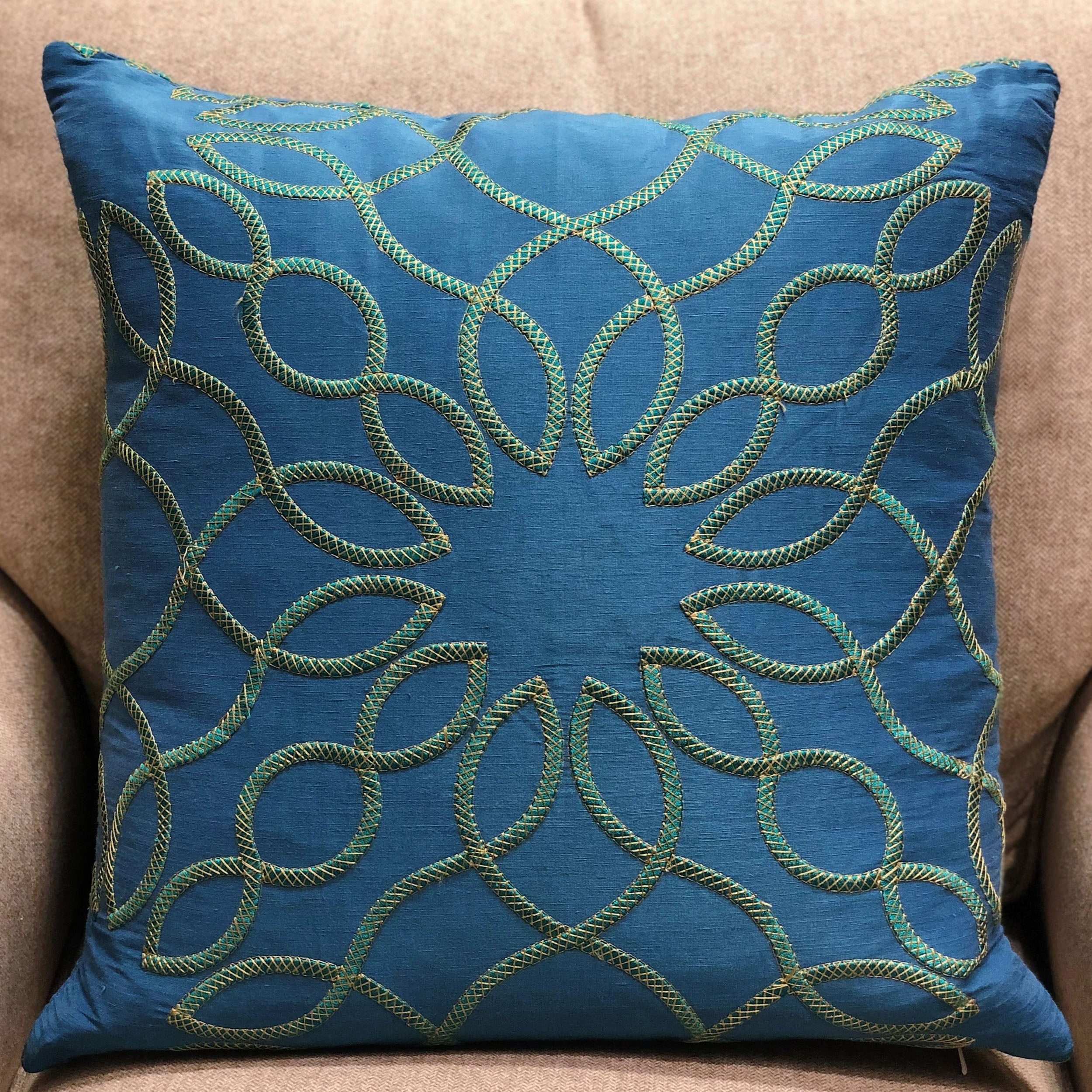 Calico Island Blue and Green Geometric Luxury Throw Pillow showcasing a vibrant geometric pattern in blue and green, made from a luxurious fabric blend.