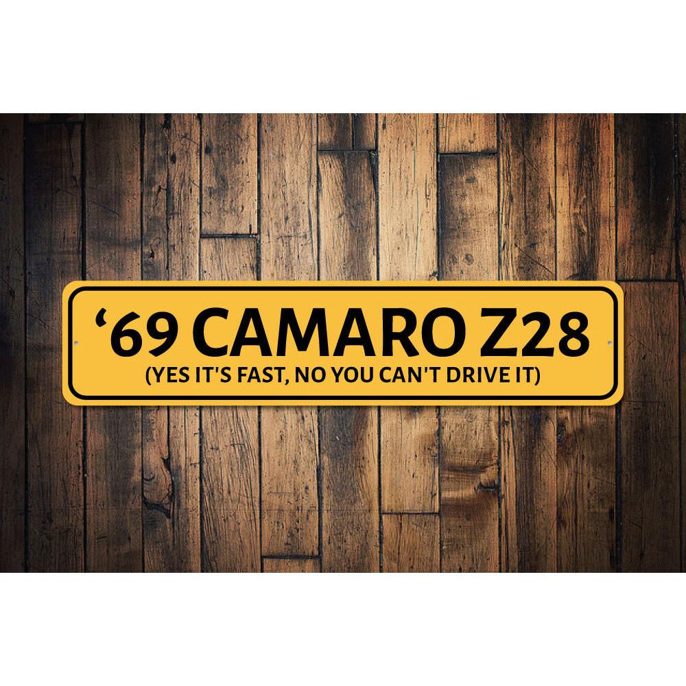 A personalized Camaro Year Sign made of high-quality aluminum, featuring vibrant colors and customizable text, perfect for garages and man caves.