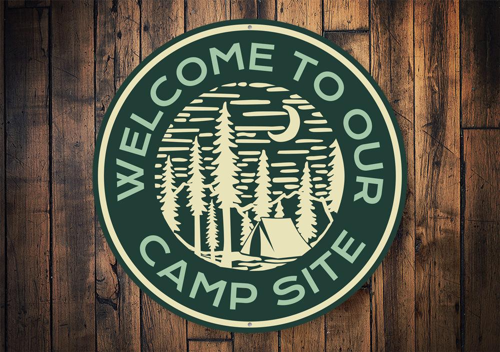 A decorative Camp Site Welcome Sign made of durable aluminum, featuring customizable text and pre-drilled holes for easy mounting.