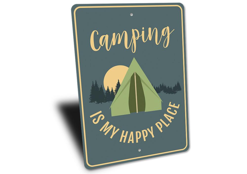 A decorative metal sign that reads 'Camping is My Happy Place', showcasing a rustic design perfect for outdoor enthusiasts.