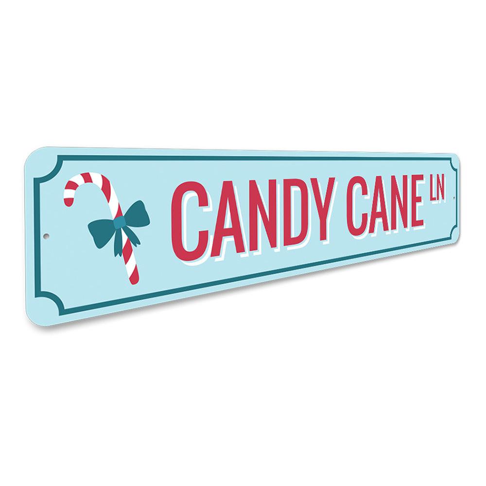 Candy Cane Ln Lane Holiday Sign featuring festive colors and charming design, perfect for Christmas decorations.