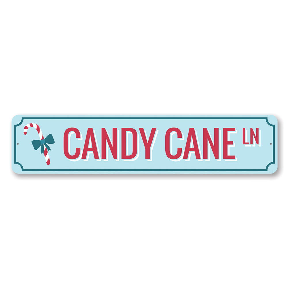 Candy Cane Ln Lane Holiday Sign featuring festive colors and charming design, perfect for Christmas decorations.