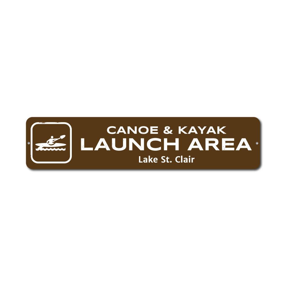 Canoe & Kayak Launch Area Sign made of durable aluminum, featuring customizable text and pre-drilled holes for easy mounting.