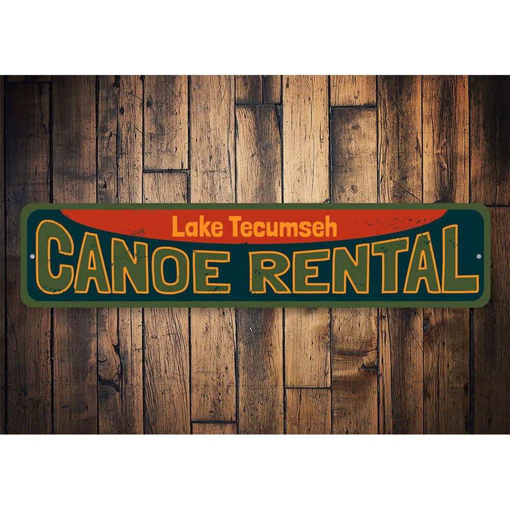 A decorative Canoe Rental Sign made of aluminum, featuring customizable text, ideal for lakehouse decor.