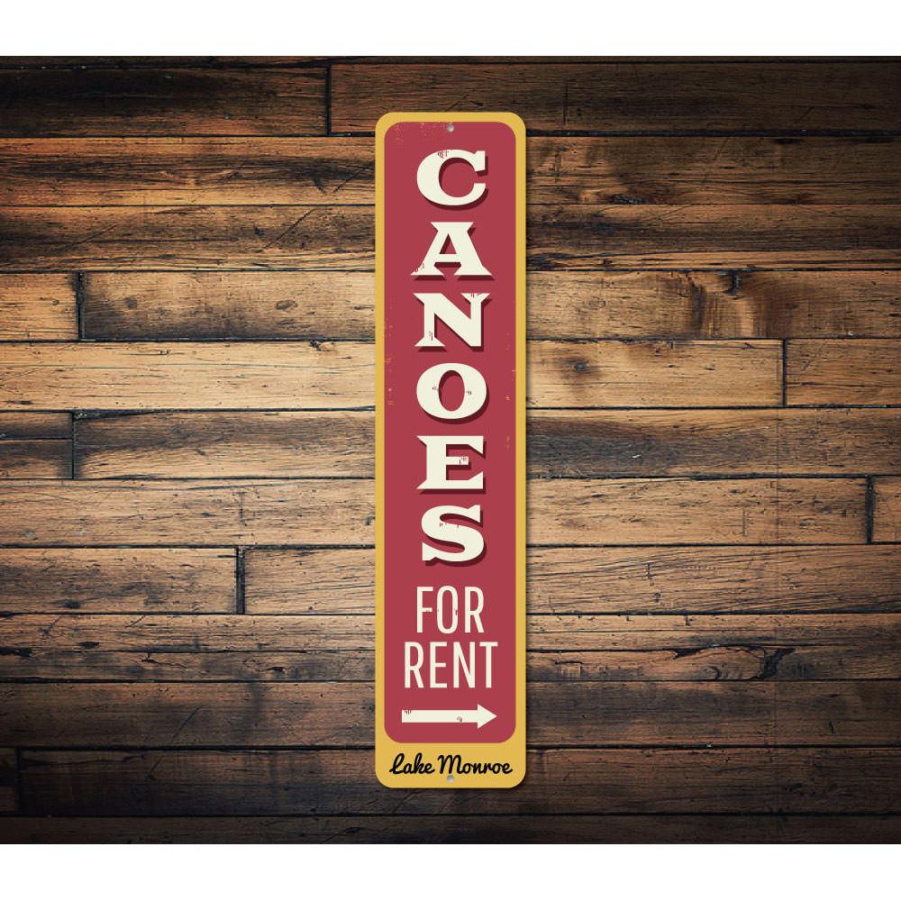 Canoes for Rent Arrow Vertical Sign made of aluminum, featuring vibrant colors and customizable text, perfect for lakeside decoration.