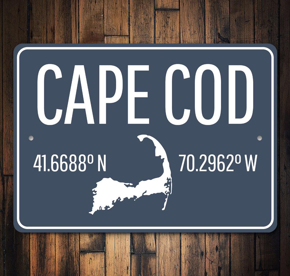 Cape Cod Coordinates Sign made of high-quality aluminum, featuring customizable text and pre-drilled holes for easy mounting, perfect for coastal decor.