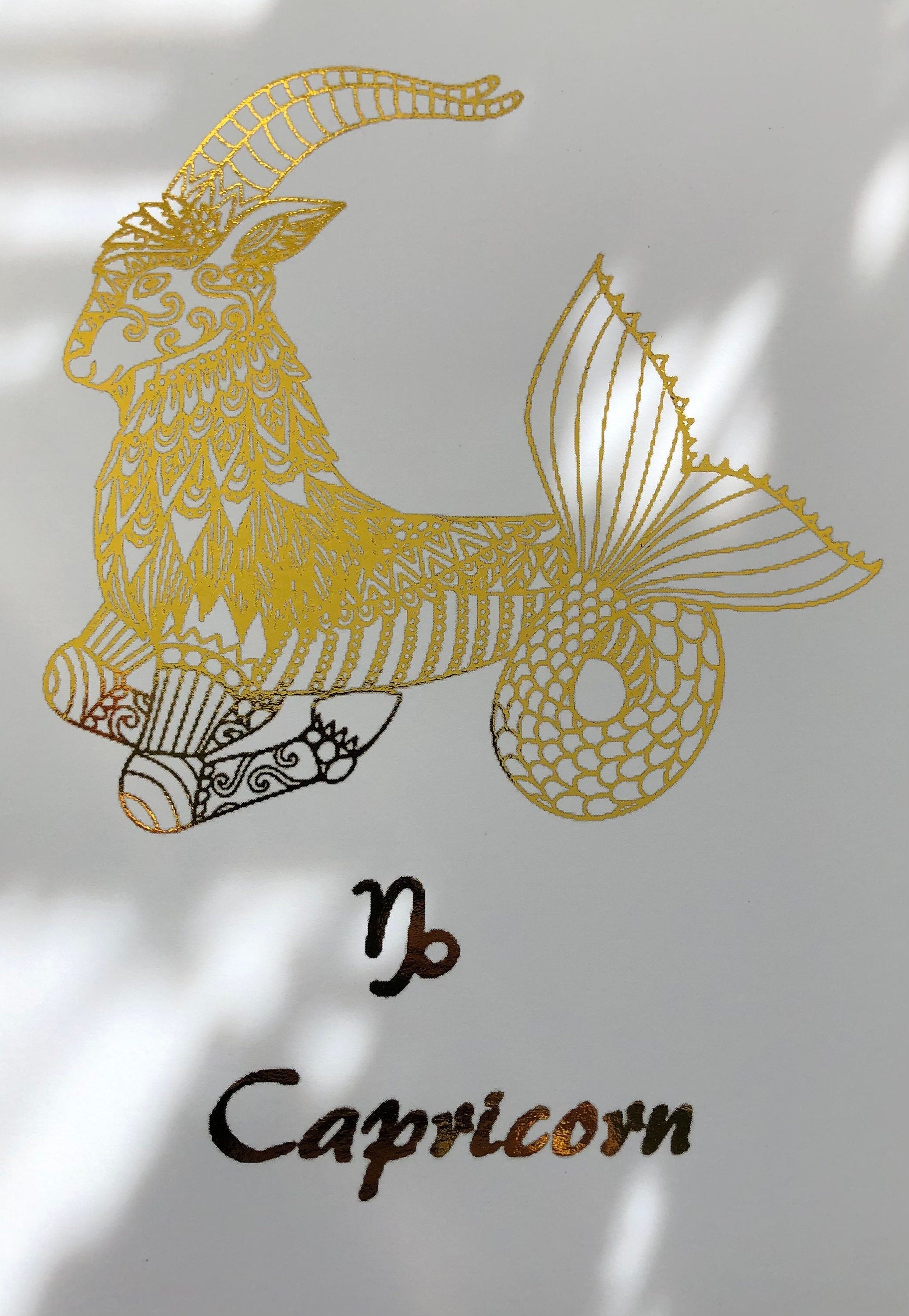 Elegant Capricorn Star Sign Foil Print showcasing zodiac traits with a sophisticated design.