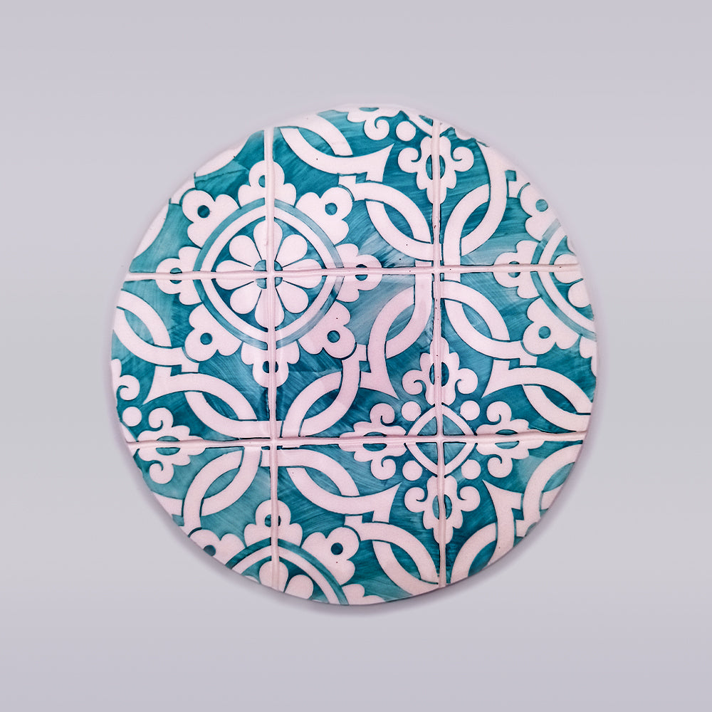 Hand-painted Carcavelos Ceramic Table Trivet showcasing intricate designs and vibrant colors, perfect for protecting surfaces.