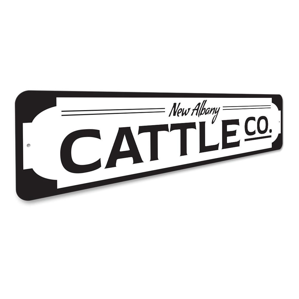 A custom Cattle Company Sign made of high-quality aluminum, featuring a rustic design suitable for home or business decor.