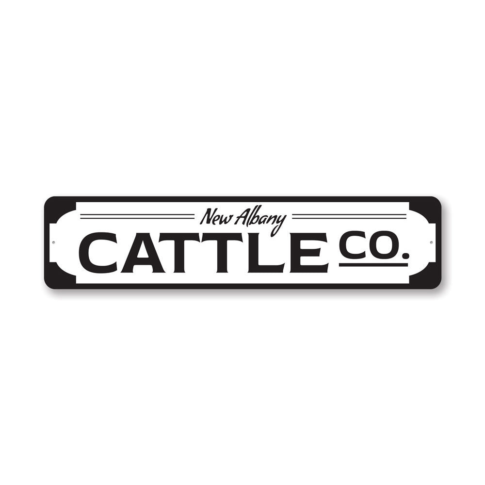 A custom Cattle Company Sign made of high-quality aluminum, featuring a rustic design suitable for home or business decor.