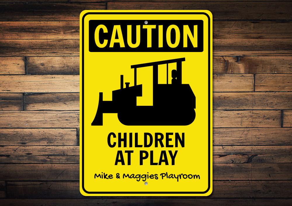 Caution Playroom Sign made of high-quality aluminum, featuring vibrant colors and customizable text, perfect for children's rooms.