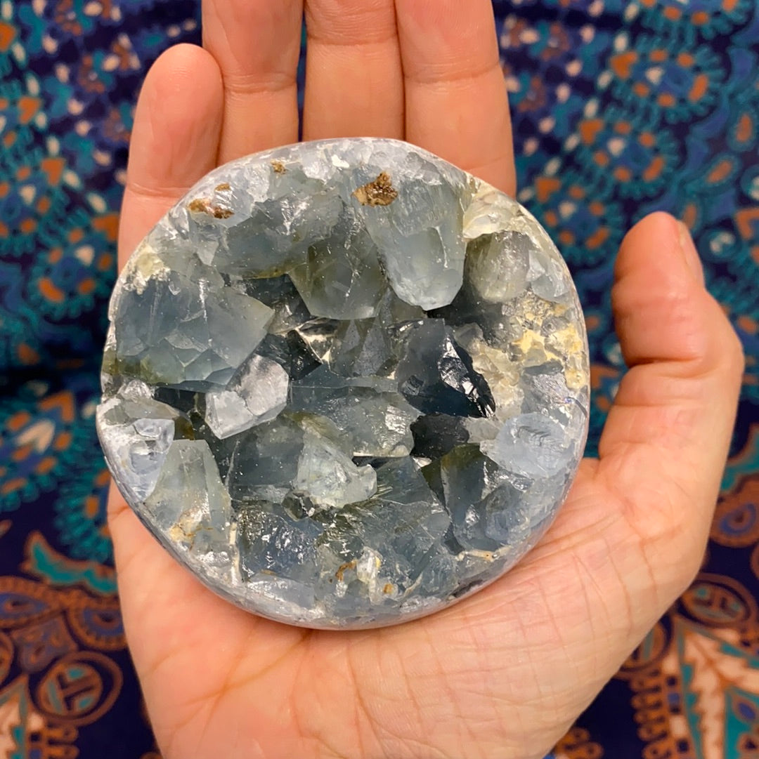 Celestite Geode Sphere #3 showcasing its beautiful blue color and unique geode formation, perfect for enhancing intuition and emotional balance.