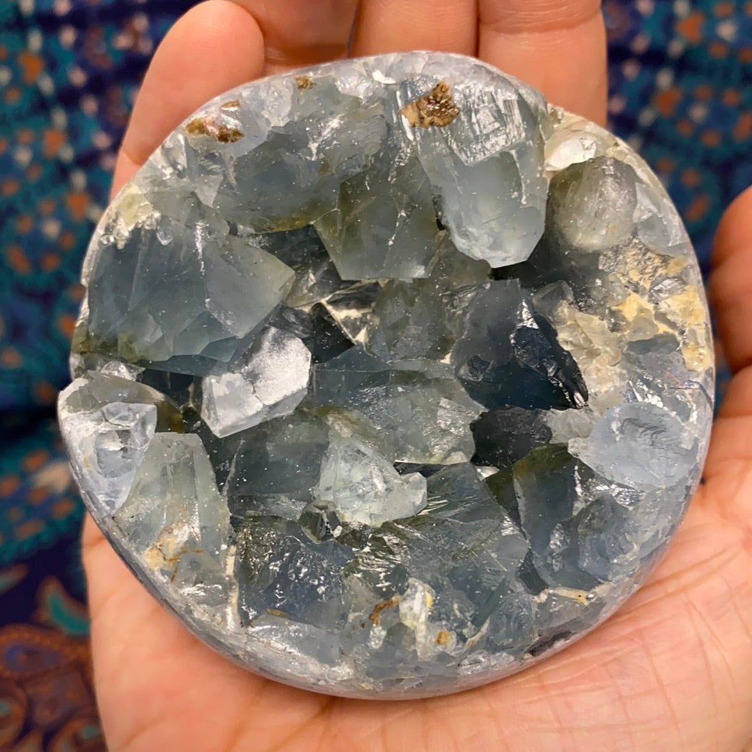 Celestite Geode Sphere #3 showcasing its beautiful blue color and unique geode formation, perfect for enhancing intuition and emotional balance.