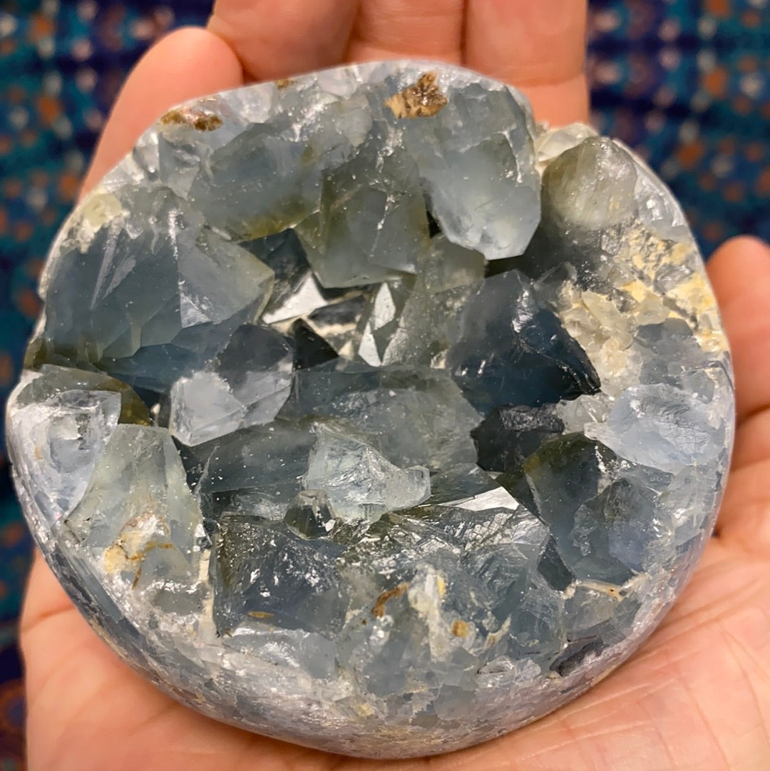 Celestite Geode Sphere #3 showcasing its beautiful blue color and unique geode formation, perfect for enhancing intuition and emotional balance.