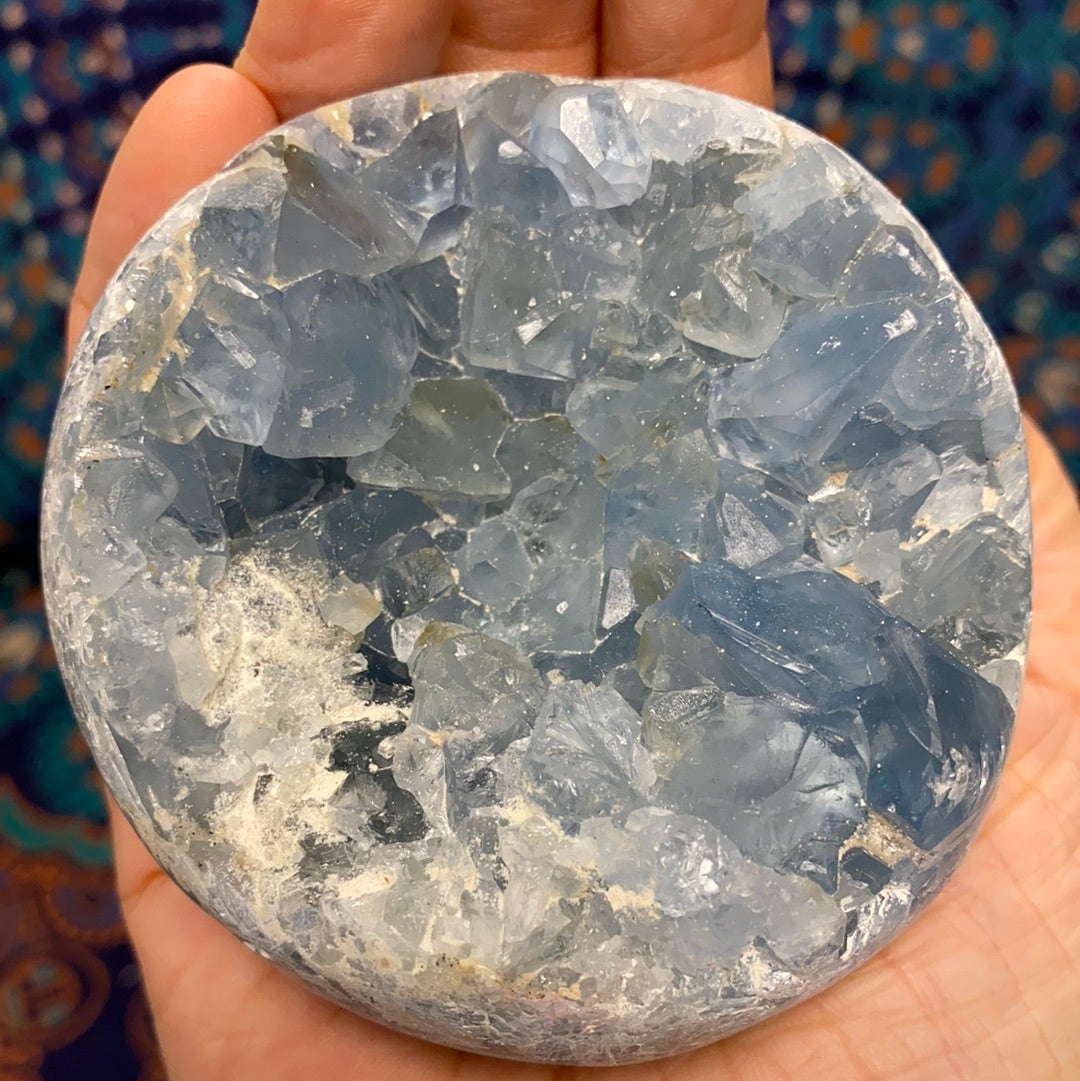 Celestite Geode Sphere #4 showcasing its beautiful blue crystals and geode formation, perfect for meditation and energy work.