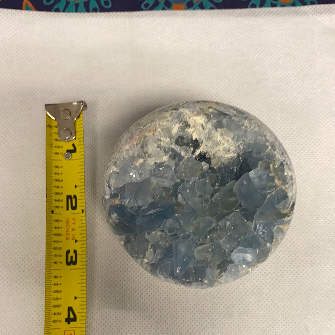 Celestite Geode Sphere #4 showcasing its beautiful blue crystals and geode formation, perfect for meditation and energy work.