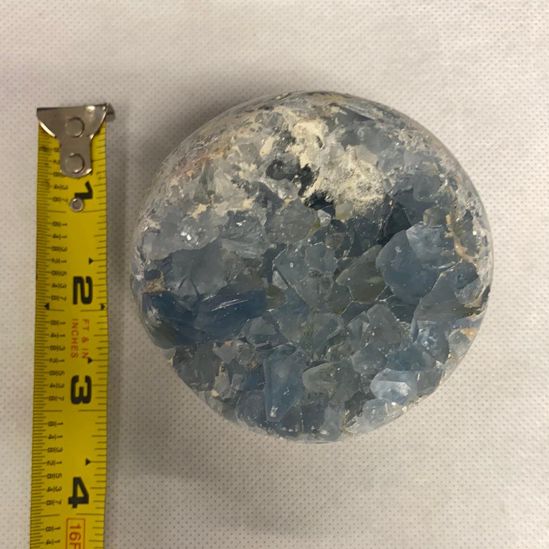 Celestite Geode Sphere #4 showcasing its beautiful blue crystals and geode formation, perfect for meditation and energy work.