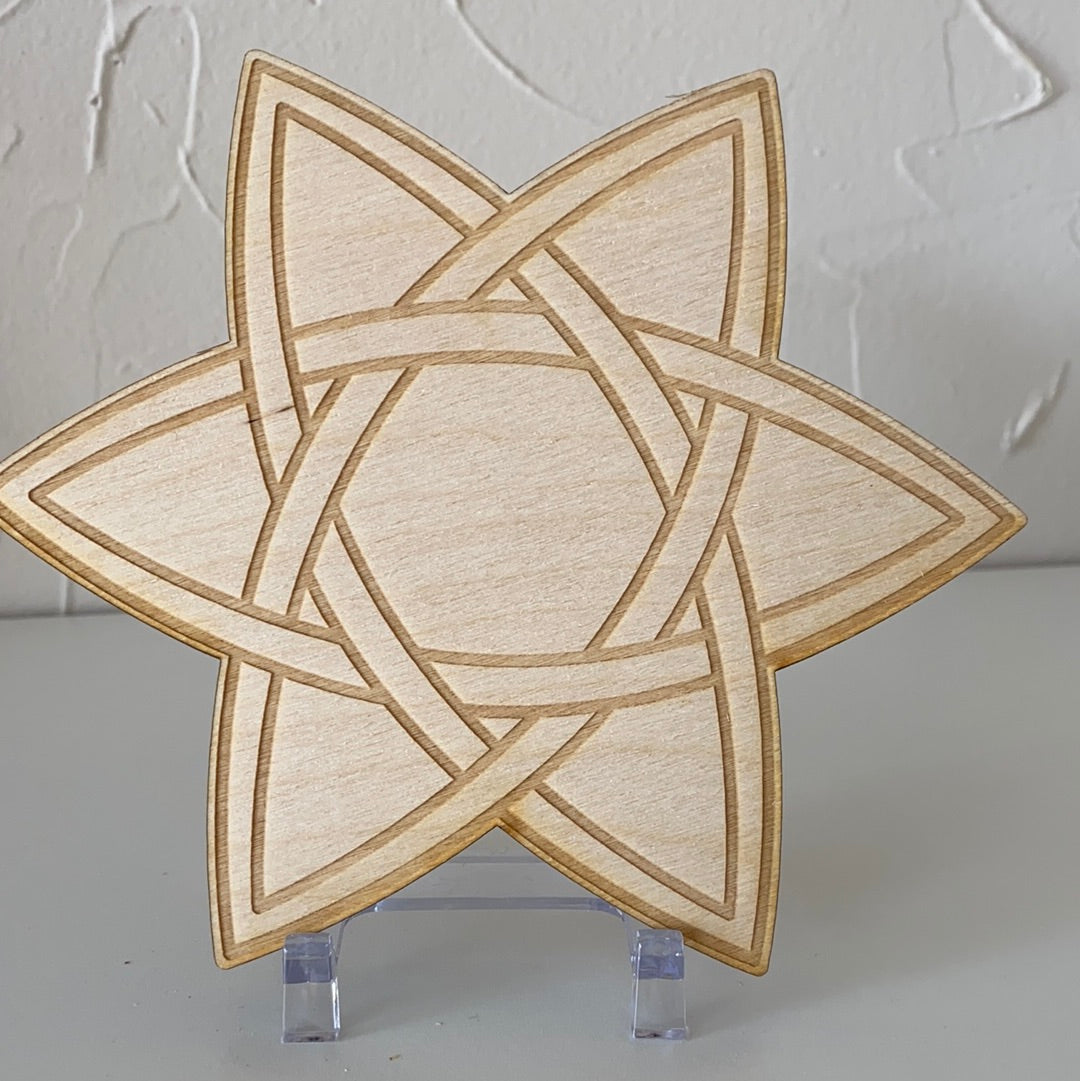 A 6-inch Celtic Star Crystal Grid made of birch wood, featuring intricate geometric patterns for crystal healing and spiritual rituals.