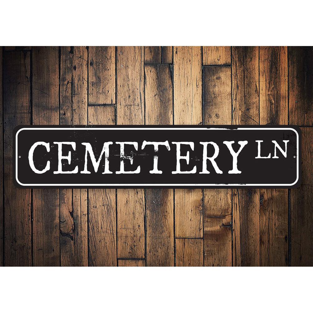 Cemetery Lane Sign featuring spooky Halloween design, made of durable aluminum with pre-drilled holes for easy mounting.