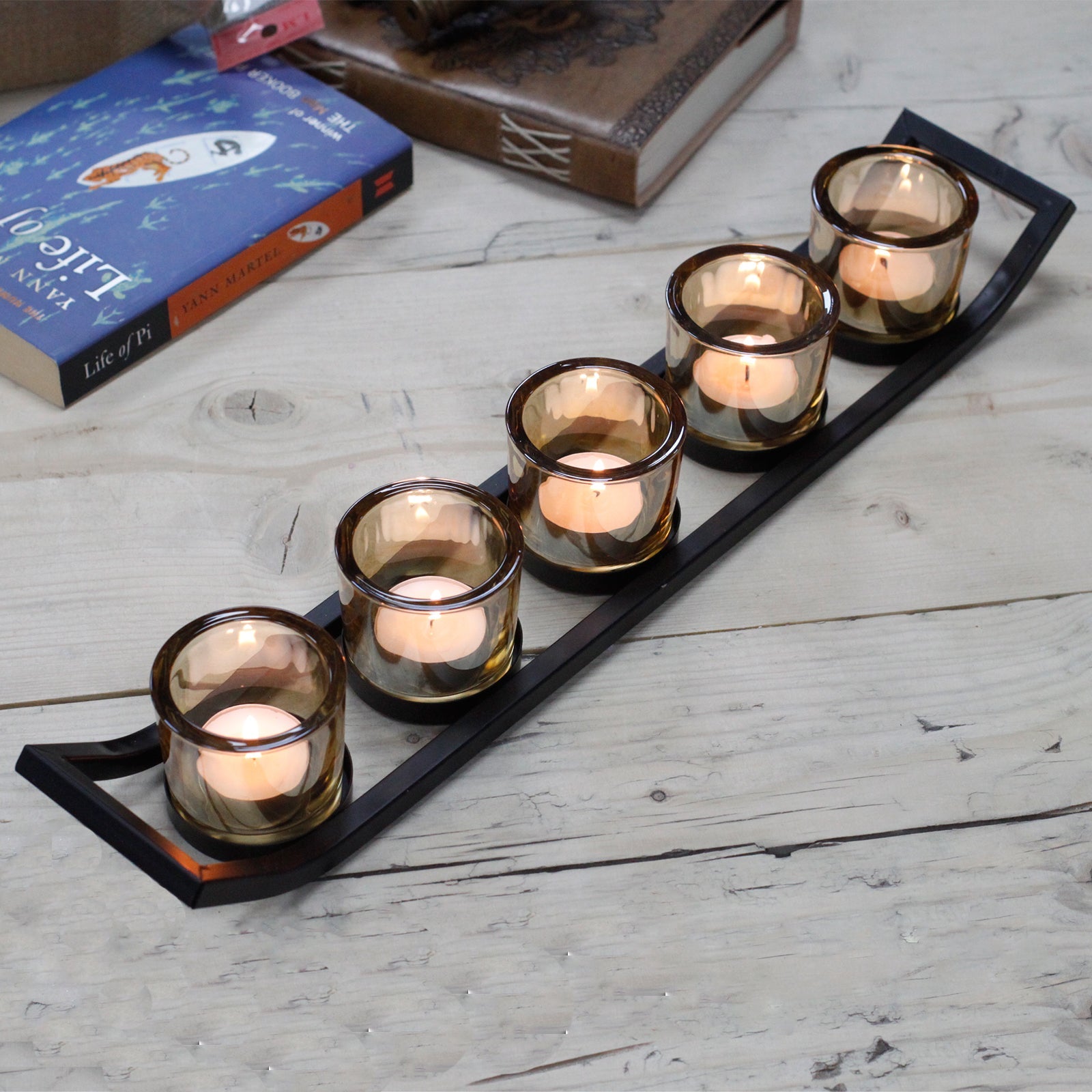 Centrepiece Iron Votive Candle Holder with five glass cups, elegantly designed for home decor.