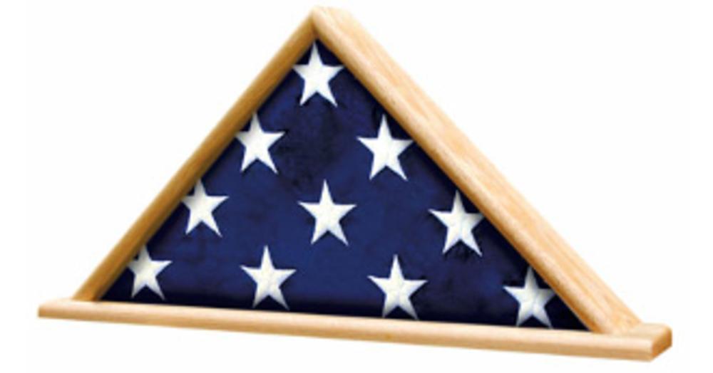 Ceremonial Flag Display Triangle made of solid Oak or Walnut, elegantly showcasing a folded flag.