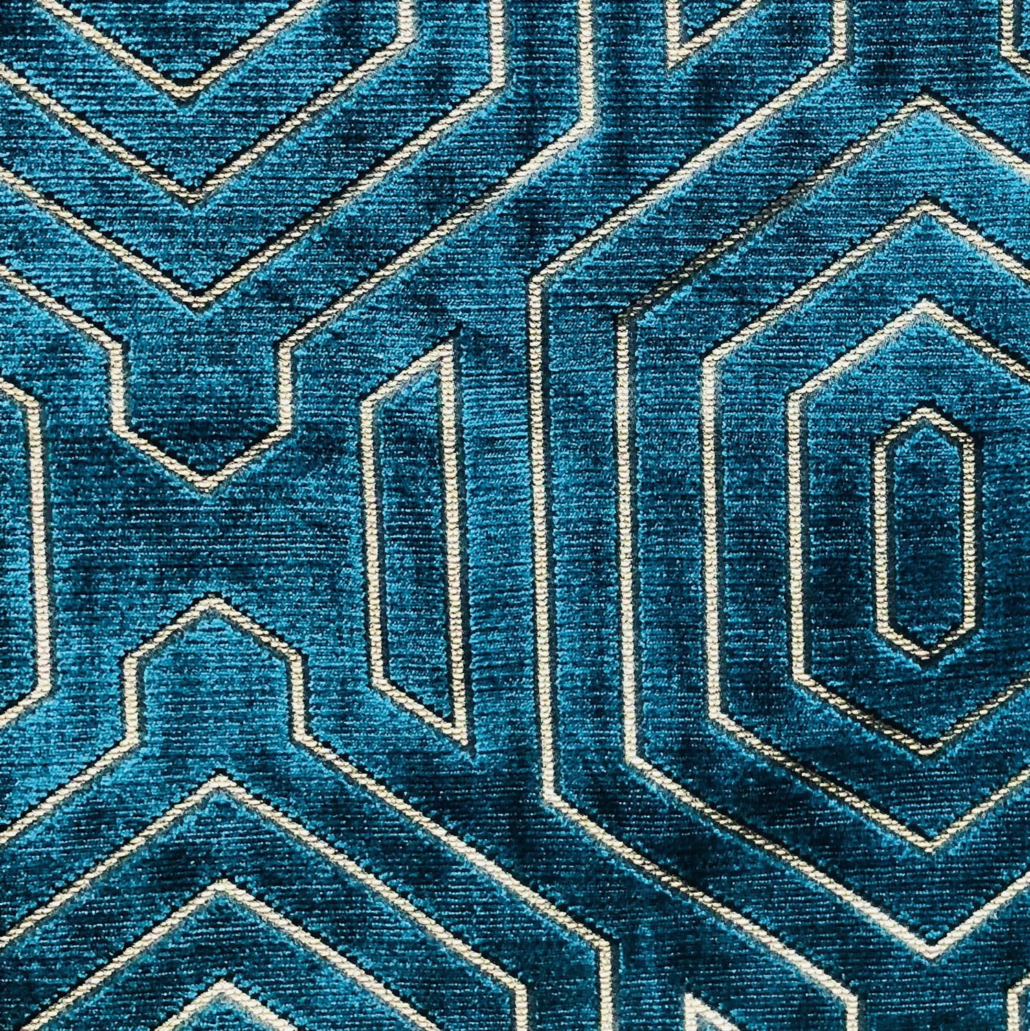 Cerulean blue geometric luxury throw pillow with handcrafted fabric and invisible zipper, showcasing a modern design.