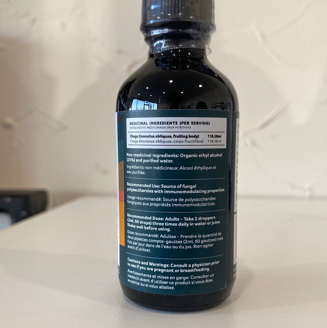 A 2oz bottle of Chaga Tincture Dual Extract with a dropper, showcasing its rich amber color.