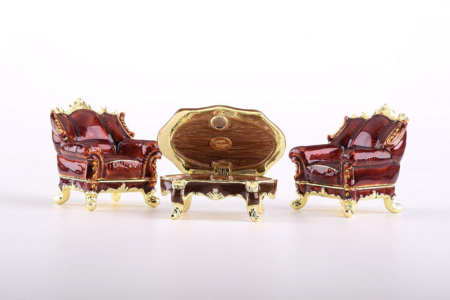 A beautifully crafted trinket box shaped like chairs and table, adorned with sparkling Austrian crystals and plated with gold or silver.