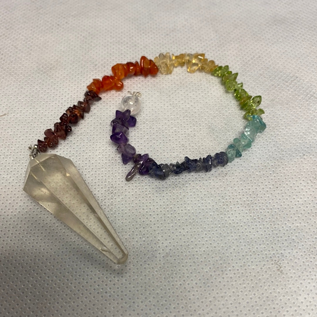 A beautifully crafted Chakra Pendulum made with high-quality crystals, designed for energy healing and chakra balancing.