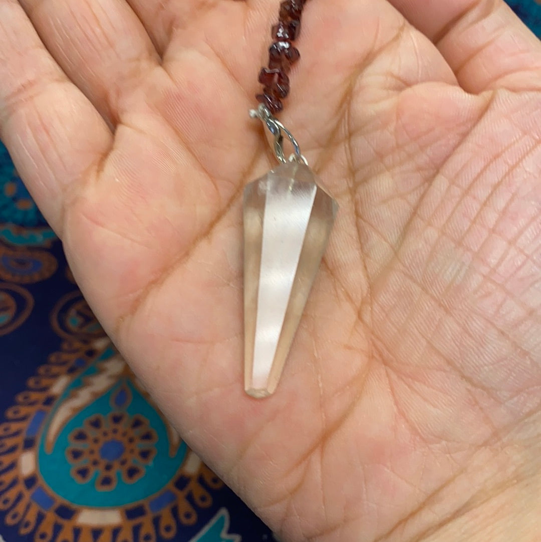 A beautifully crafted Chakra Pendulum made with high-quality crystals, designed for energy healing and chakra balancing.