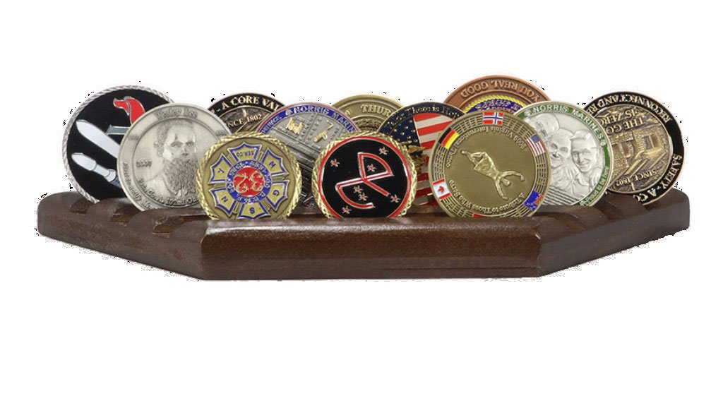 A three-row walnut Challenge Coin display holding multiple challenge coins, showcasing its elegant design and sturdy construction.