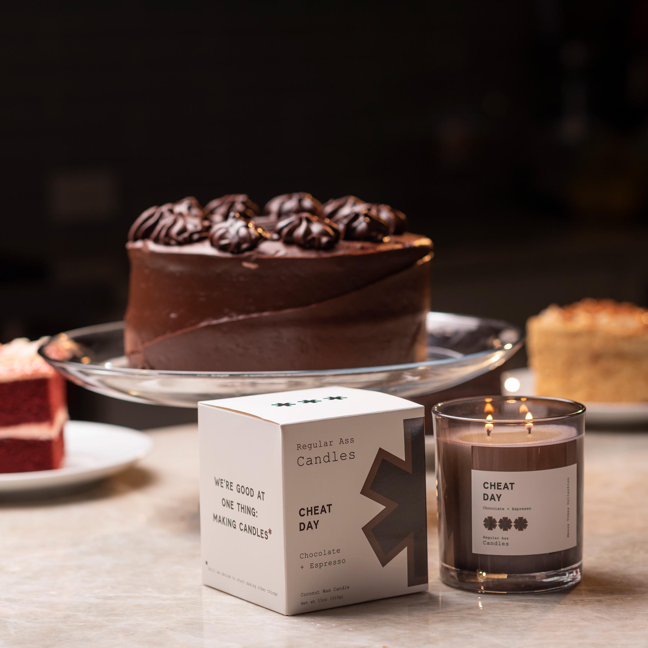 Cheat Day Chocolate + Espresso 11oz Candle in a stylish jar, showcasing its rich aroma and eco-friendly design.