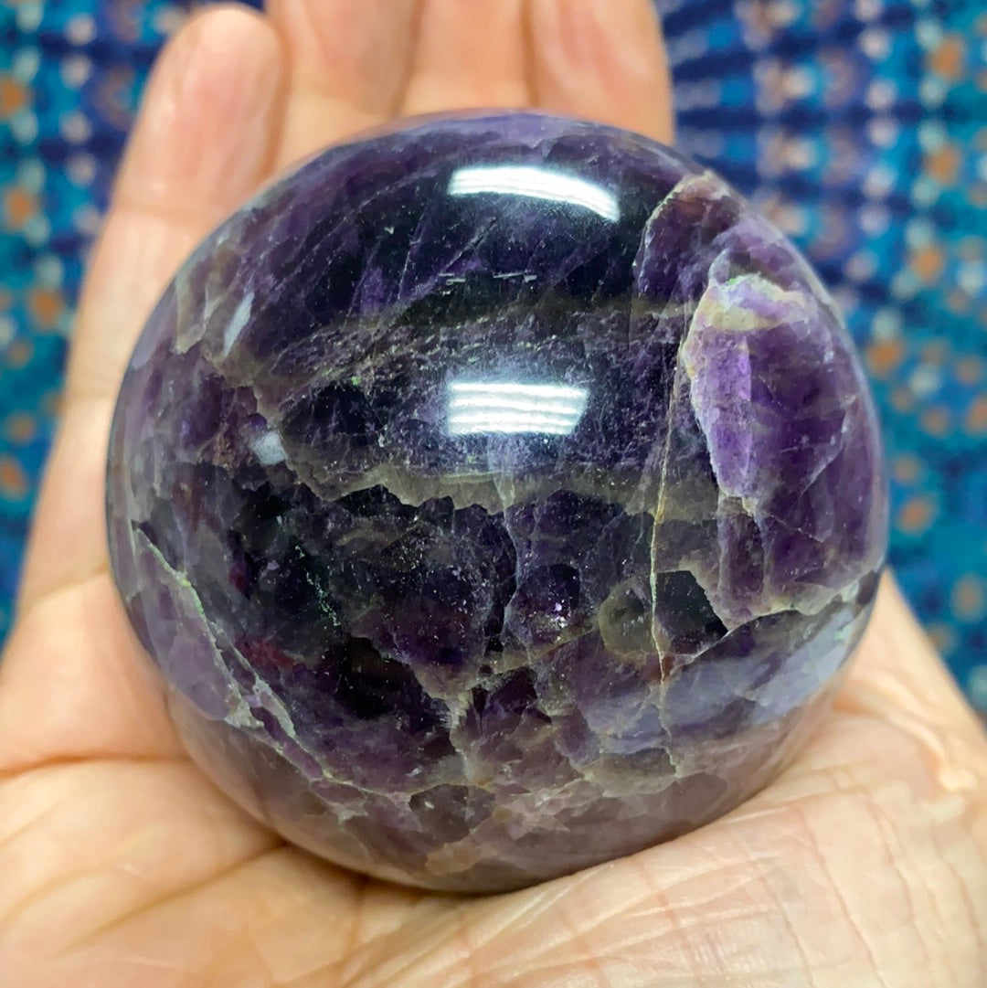 Chevron Amethyst Sphere #4, a 2.5-inch diameter crystal with banded purple and white patterns, weighing 385 grams.