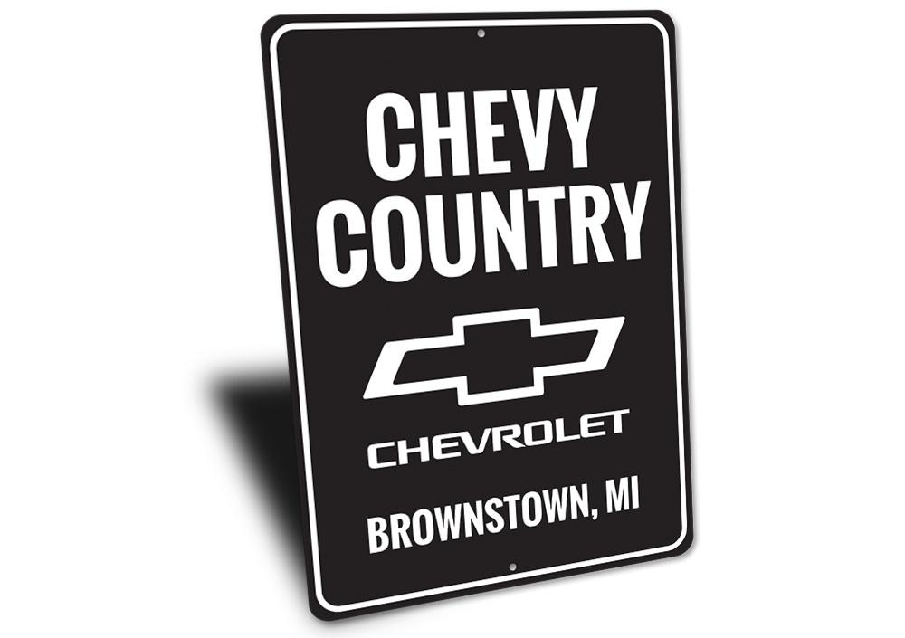 A vibrant Chevy Country Sign made of high-quality aluminum, featuring customizable text, perfect for garages and man caves.