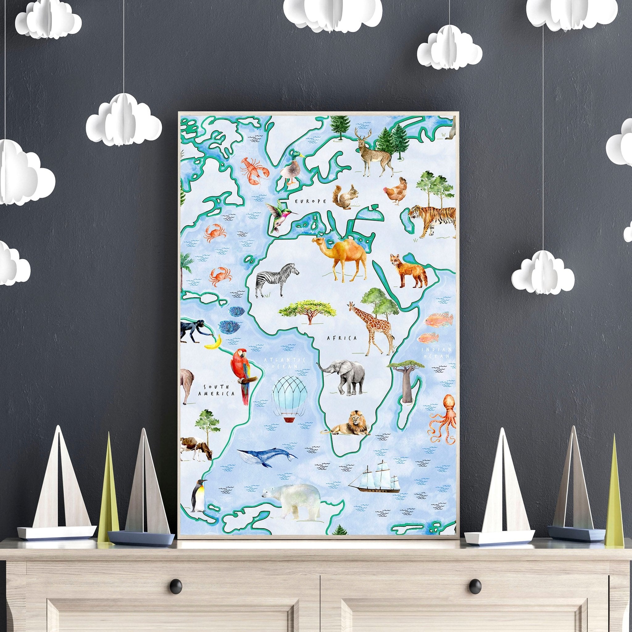 Set of 2 children's world map wall art prints featuring animals from various regions, designed for nursery or playroom decor.