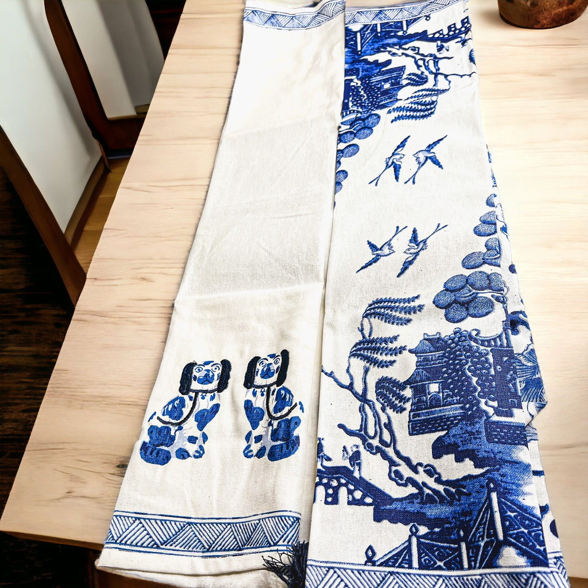 Beautiful Chinoiserie Tea Towels with blue and white embroidery and decorative tassels, showcasing their oversized design.