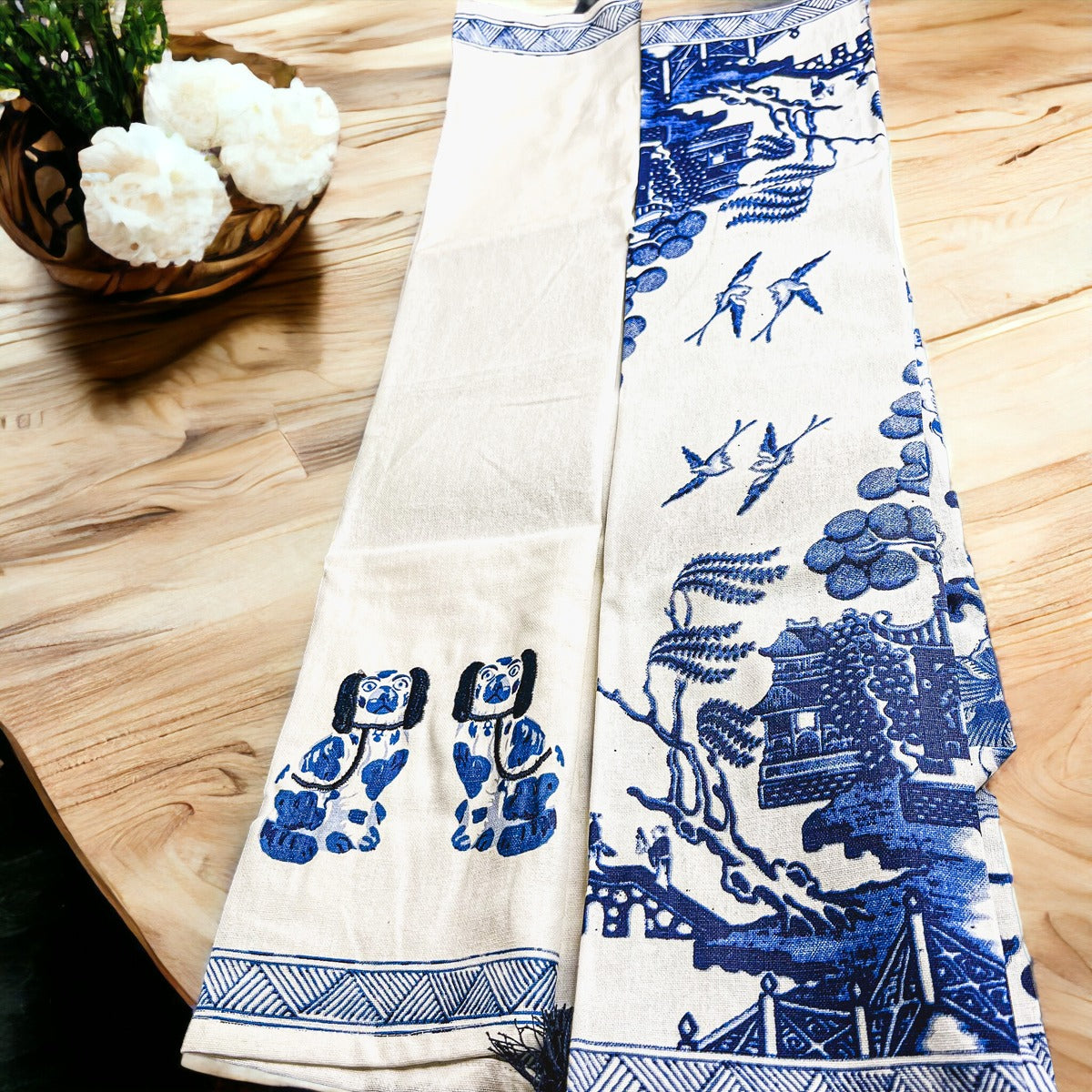 Beautiful Chinoiserie Tea Towels with blue and white embroidery and decorative tassels, showcasing their oversized design.