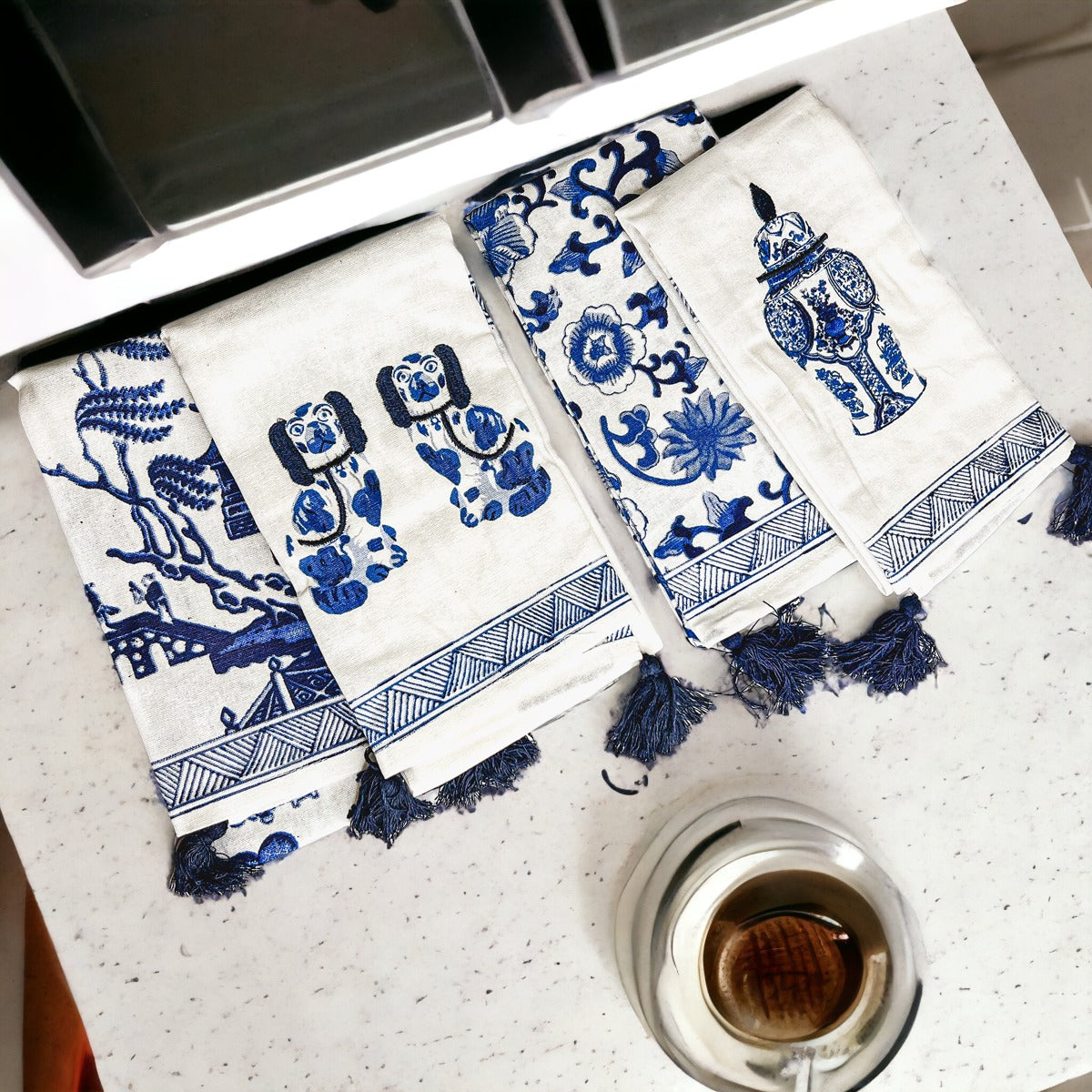 Beautiful Chinoiserie Tea Towels with blue and white embroidery and decorative tassels, showcasing their oversized design.