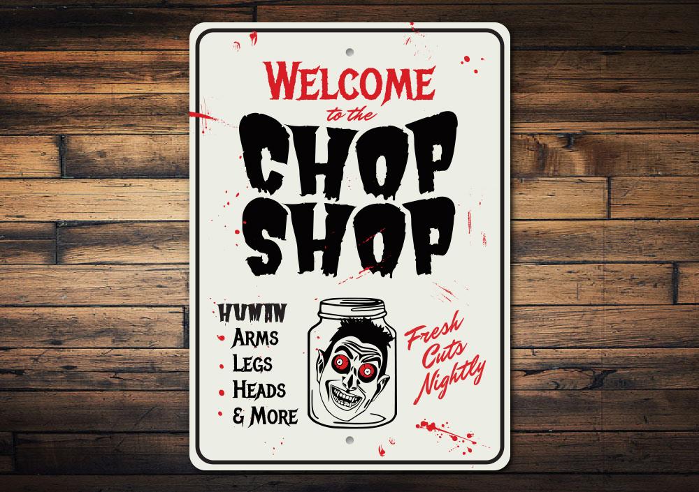 Chop Shop Halloween Sign made of durable aluminum, featuring spooky graphics perfect for Halloween decor.