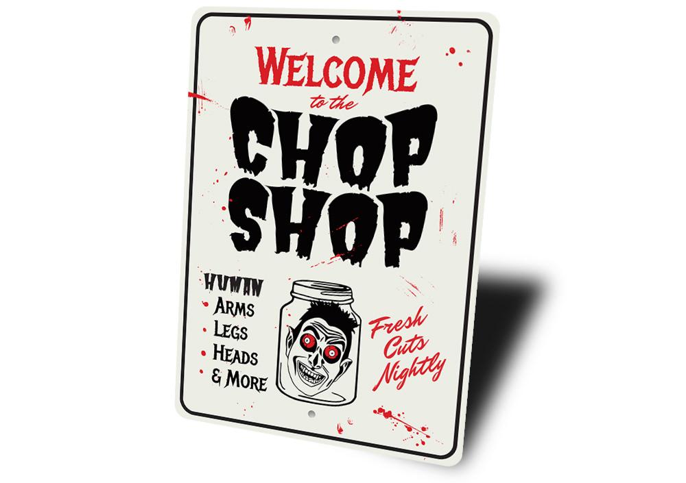 Chop Shop Halloween Sign made of durable aluminum, featuring spooky graphics perfect for Halloween decor.