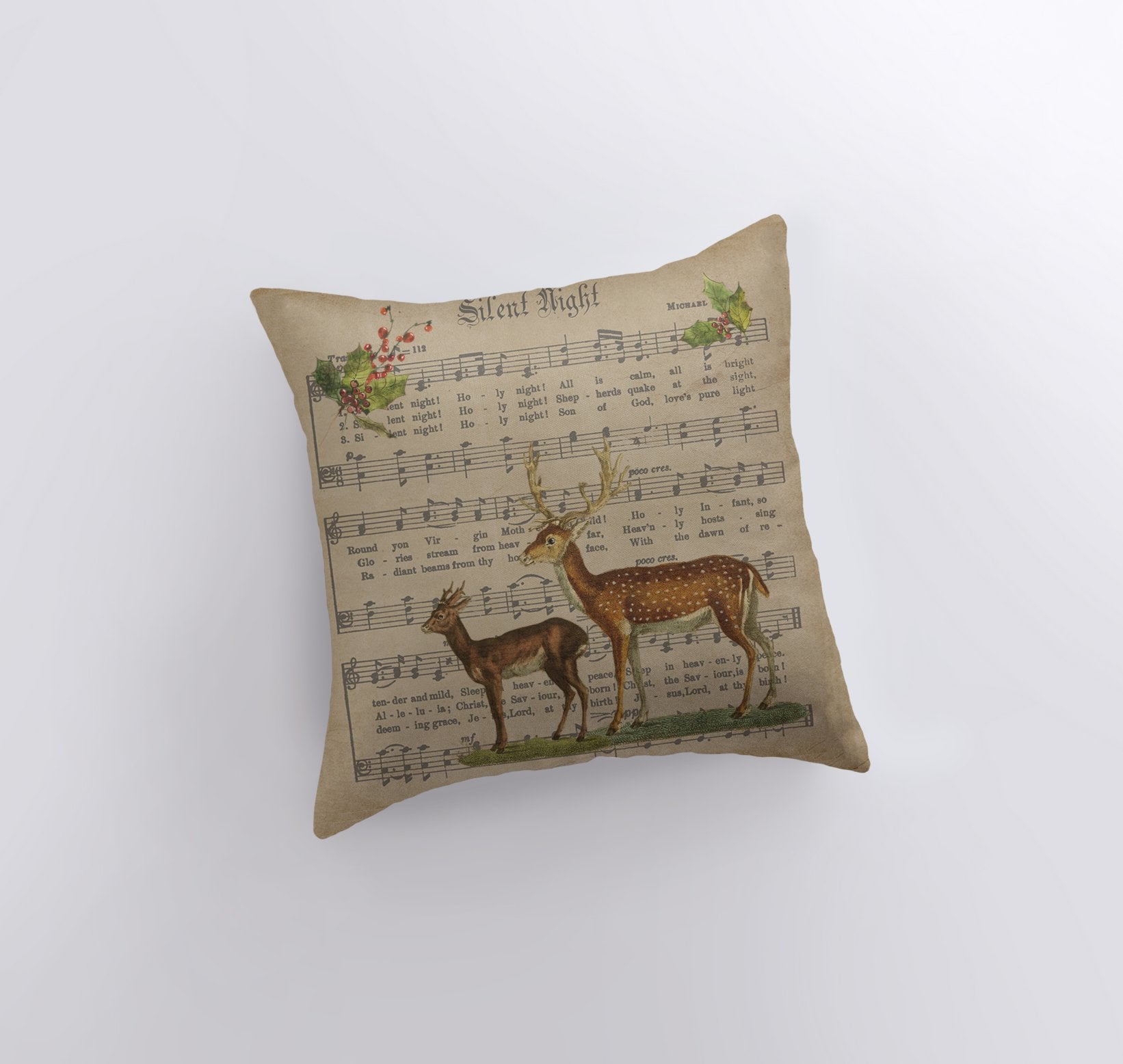 Rustic Silent Night Pillow featuring sheet music design with deer and holly branches, handmade in America.