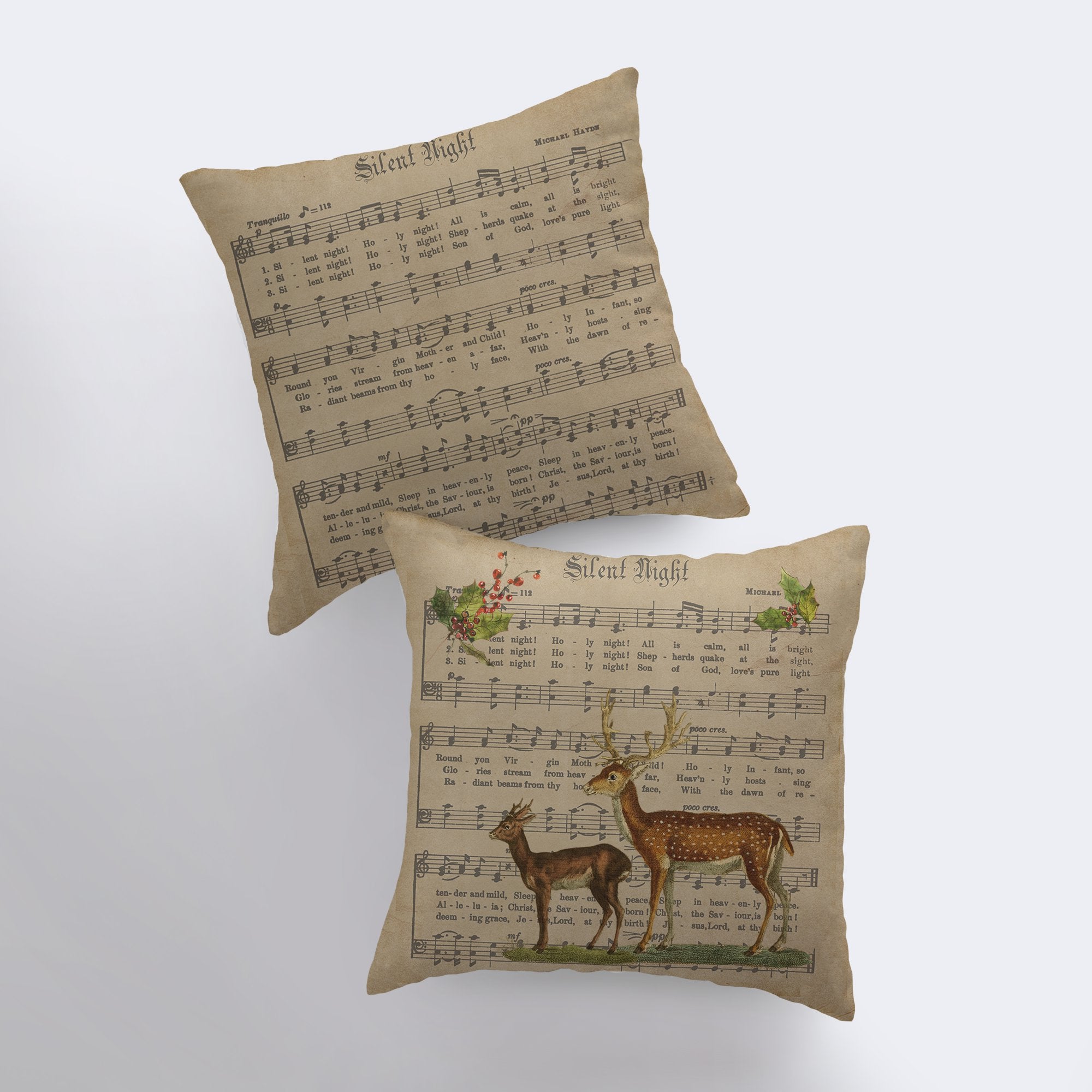 Rustic Silent Night Pillow featuring sheet music design with deer and holly branches, handmade in America.