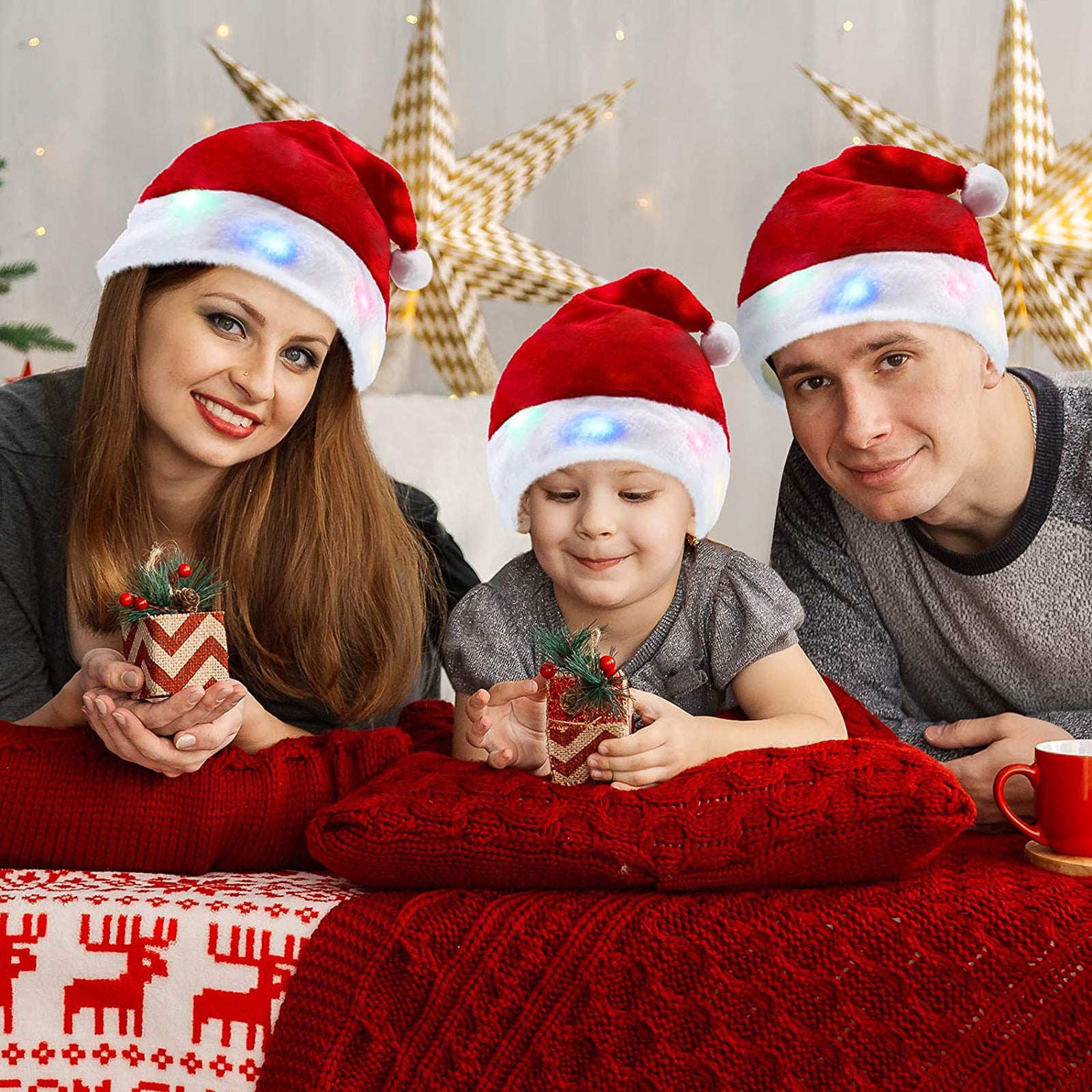 Two adult-sized Christmas Glowing Santa Hats with multicolor LED lights, made of soft plush material, perfect for festive celebrations.